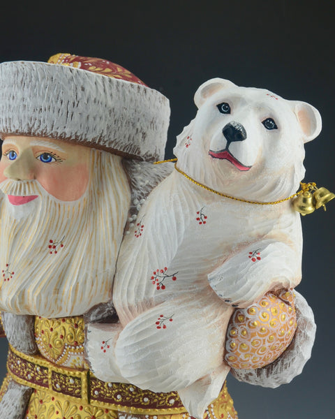 Festive Red Russian Santa Claus Holding a Polar Bear 14.5 inch