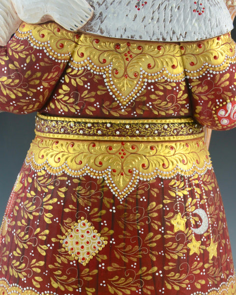 Festive Red Russian Santa Claus Holding a Polar Bear 14.5 inch