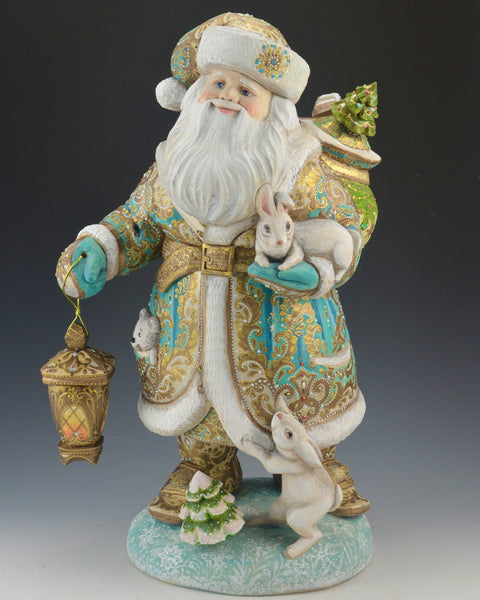 16 inch Blue and Gold Santa Carving with Rabbits and a Lantern