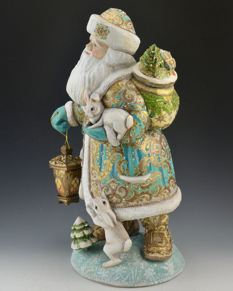 16 inch Blue and Gold Santa Carving with Rabbits and a Lantern