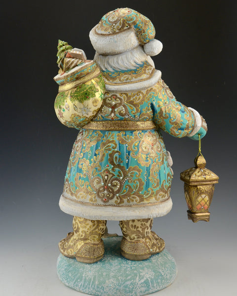 16 inch Blue and Gold Santa Carving with Rabbits and a Lantern