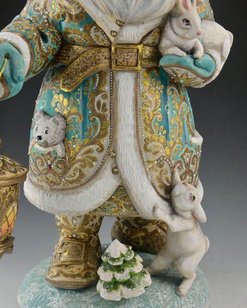 16 inch Blue and Gold Santa Carving with Rabbits and a Lantern