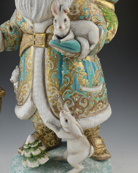 16 inch Blue and Gold Santa Carving with Rabbits and a Lantern