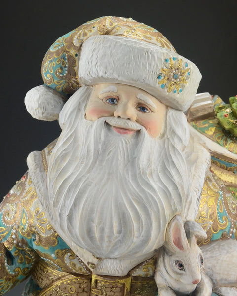 16 inch Blue and Gold Santa Carving with Rabbits and a Lantern