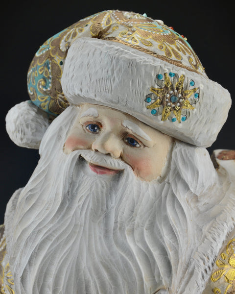 16 inch Blue and Gold Santa Carving with Rabbits and a Lantern