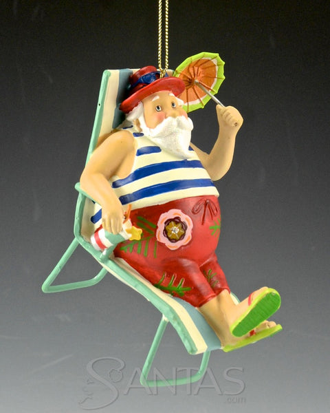 Santa Relaxing in a Beach Chair with Umbrella and Cocktail