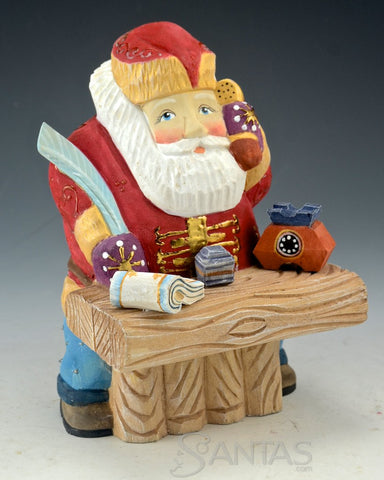 North Pole Logistics - Wooden Russian Santa at Desk