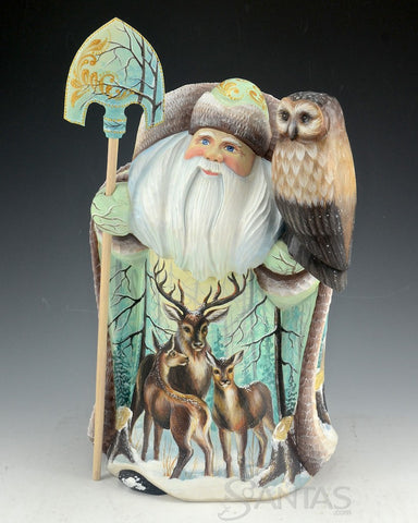 Wilderness Santa carving with Elk and Moose and Holding an Owl