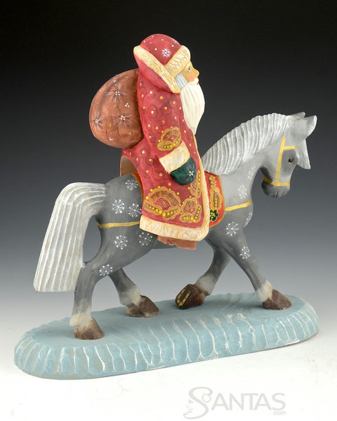 Santa on Horse Prancing into Christmas Carved Russian Santa
