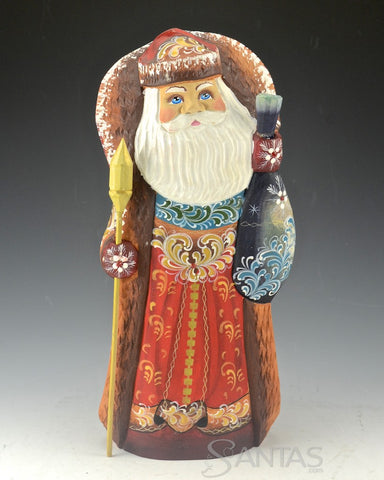 10.5 inch Decorative Carved Santa with Staff and Toy Bag