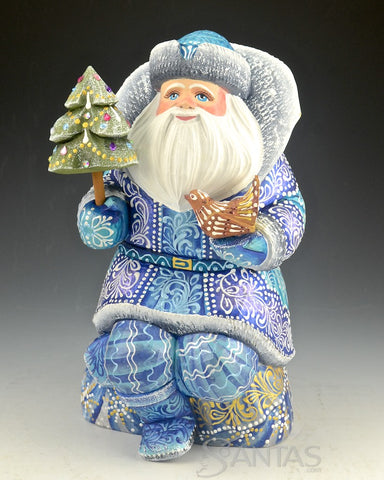 Blue Santa Sitting on Toy Bag Holding a Bird and Tree 10 inch Russian Santa Carving