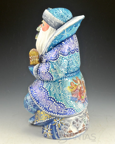 Blue Santa Sitting on Toy Bag Holding a Bird and Tree 10 inch Russian Santa Carving