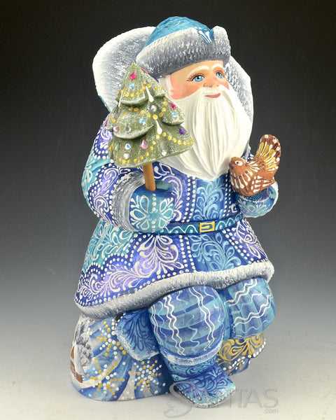 Blue Santa Sitting on Toy Bag Holding a Bird and Tree 10 inch Russian Santa Carving