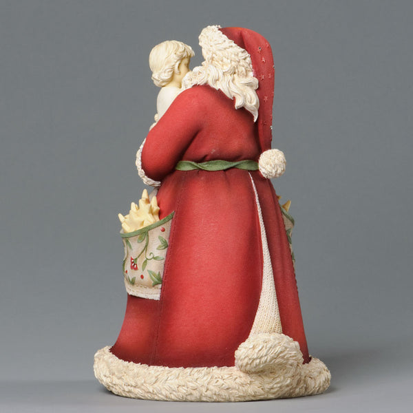 Santa Holding Child and Stars - Heart of Christmas