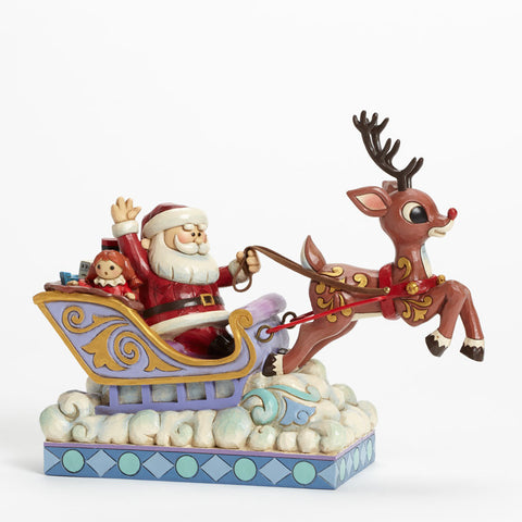 Rudolph Pulling Santa in Sleigh