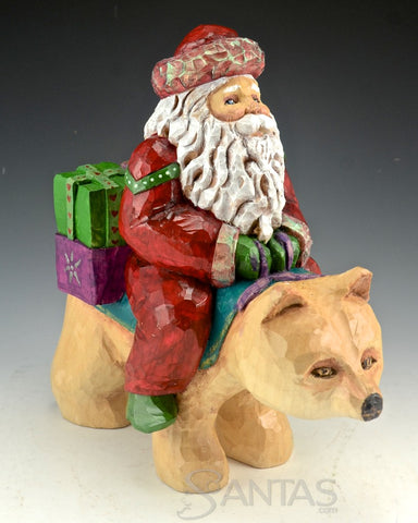 Santa Delivery on a Bear Wood Carving by Barbara Scoles