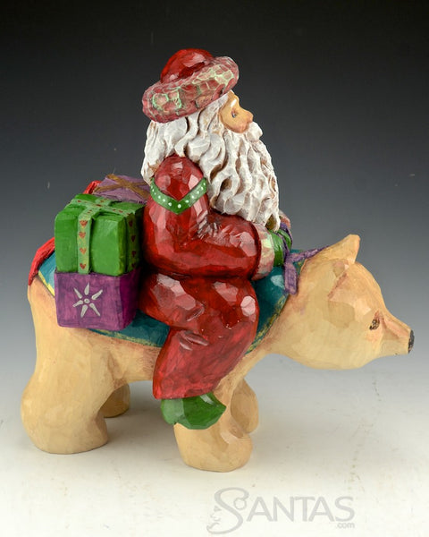 Santa Delivery on a Bear Wood Carving by Barbara Scoles