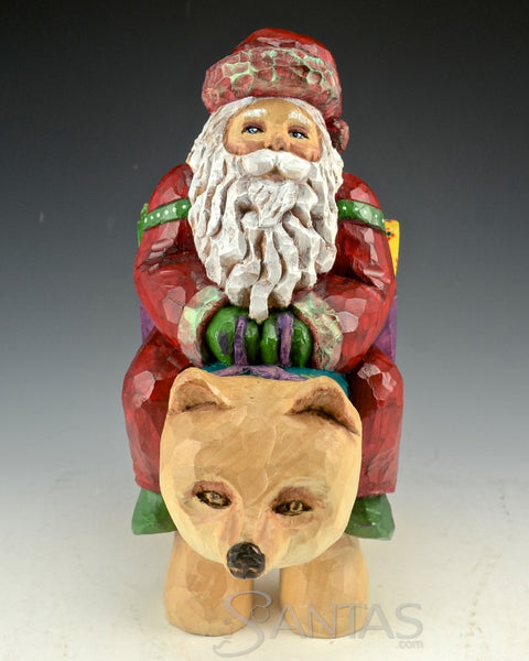 Santa Delivery on a Bear Wood Carving by Barbara Scoles