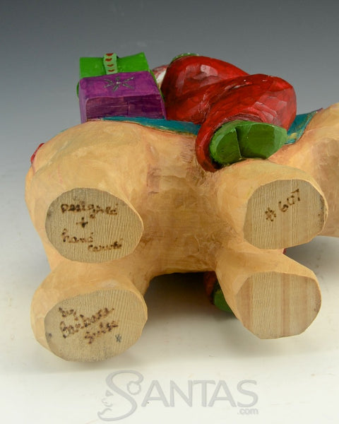 Santa Delivery on a Bear Wood Carving by Barbara Scoles