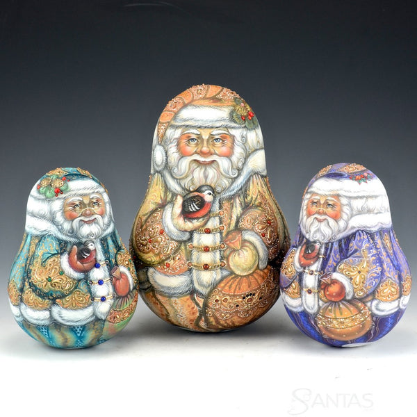 Roly poly comparison of 8 inch and 5.5 inch Santas