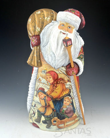 Scenic Russian Santa carving with Children and Floral Gown