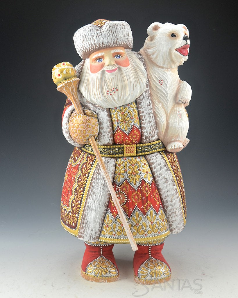 Red Russian Santa Carving holding a Polar Bear | santas.com