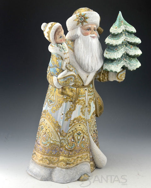 Elegant Russian Santa Carving Holding a Child and Christmas Tree