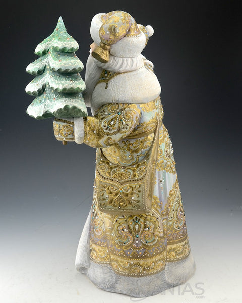 Elegant Russian Santa Carving Holding a Child and Christmas Tree
