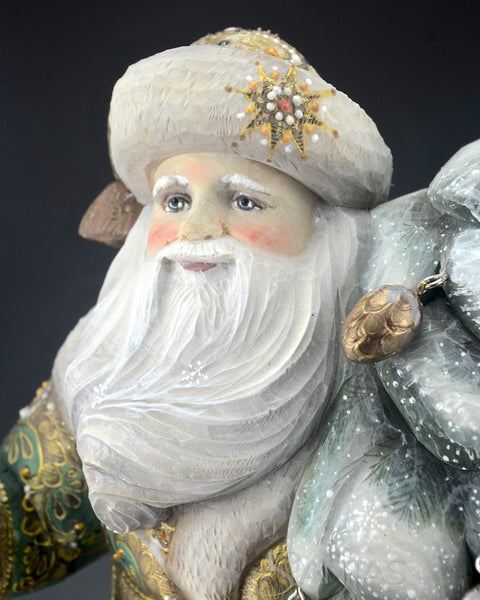 Emerald Green Russian Santa Carving with Bear and Holding a Christmas Tree