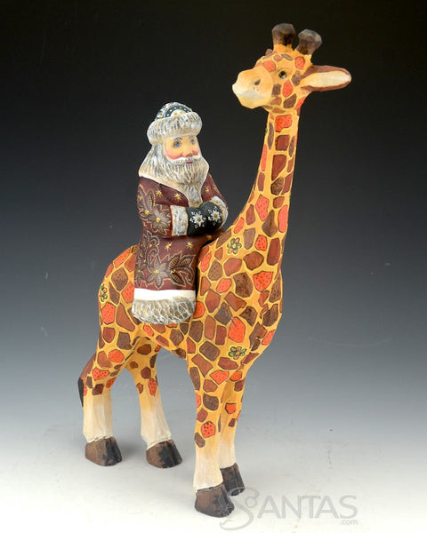 Russian Carved Santa Claus Riding on a Giraffe 13 inch