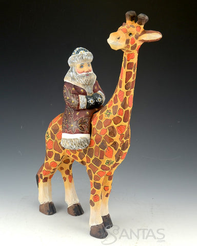 Russian Carved Santa Claus Riding on a Giraffe 13 inch