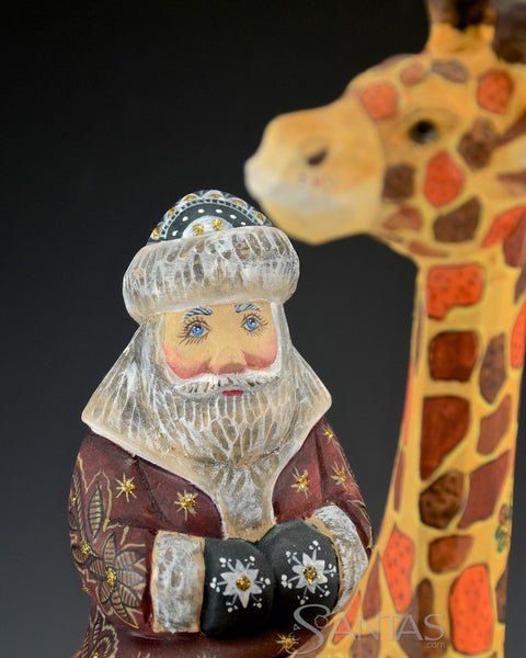 Russian Carved Santa Claus Riding on a Giraffe 13 inch