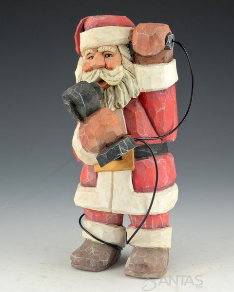 Carved Santa with Vintage Phone by Russell Scott
