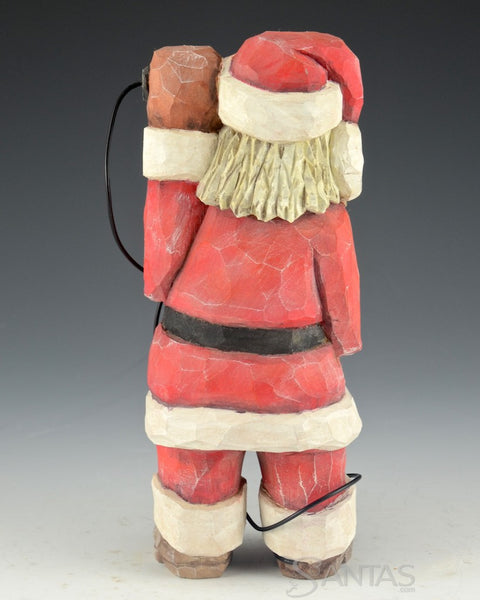 Carved Santa with Vintage Phone by Russell Scott