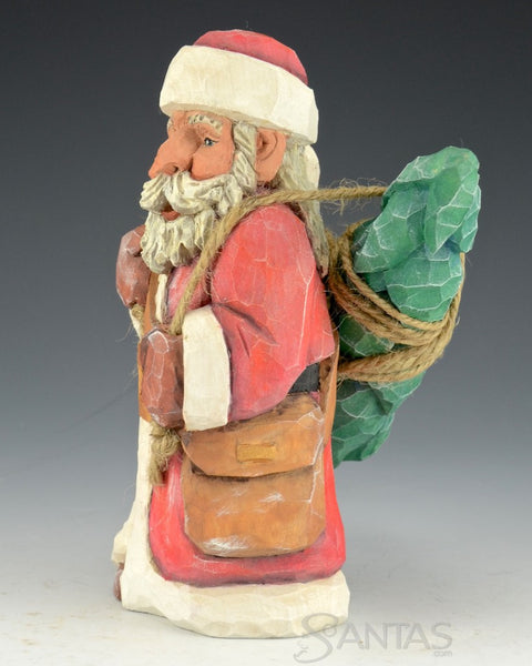 Santa Carrying Tree on His Back by Russell Scott