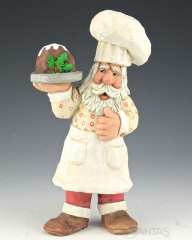 Russell Scott Chef Santa carving with Plum Pudding