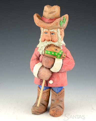Russell Scott Cowboy Santa with Stick Pony