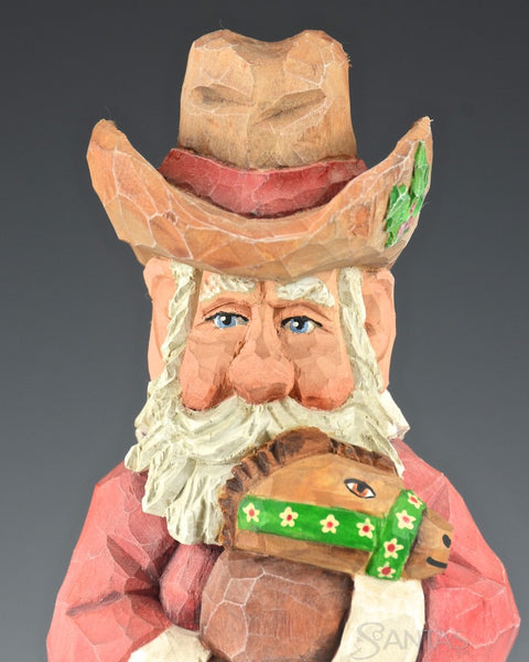 Russell Scott Cowboy Santa with Stick Pony