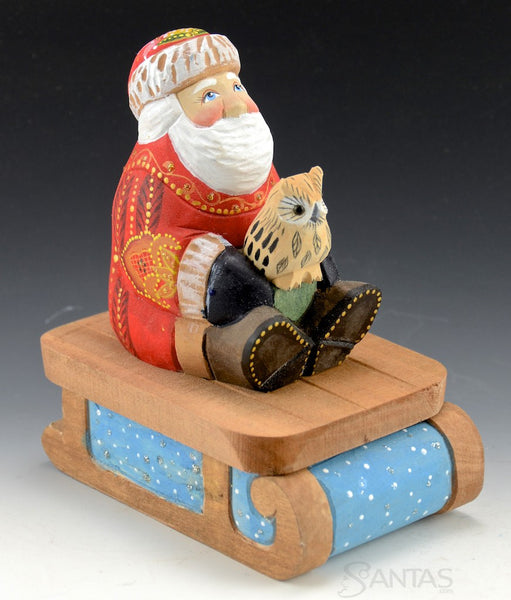 Wooden Santa and Owl on Secret Box Sled