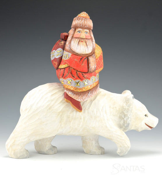 Santa Claus riding a Polar Bear
