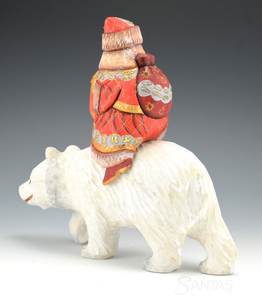 Santa Claus riding a Polar Bear
