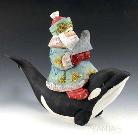 Santa Riding Orca with Baby Seal