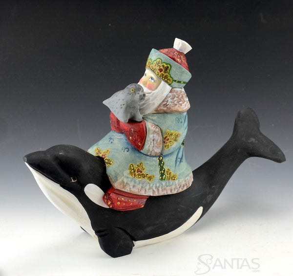 Santa Riding Orca with Baby Seal