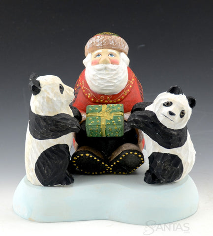 Santa Claus with Two Panda Bears