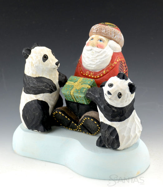 Santa Claus with Two Panda Bears