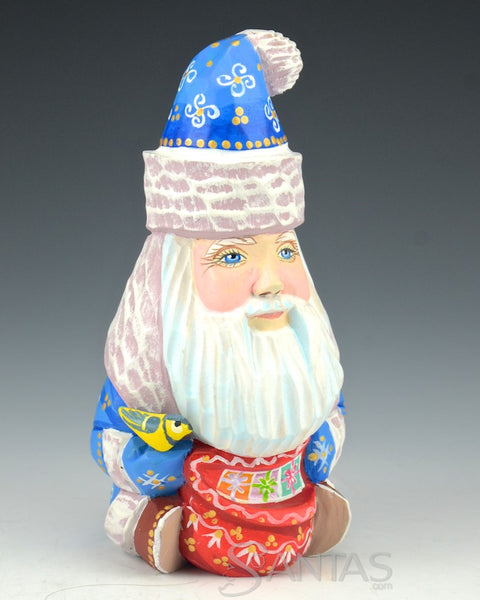 Sitting Blue Russian Santa with Bird and Toybag