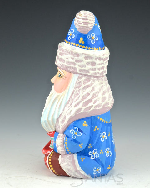 Sitting Blue Russian Santa with Bird and Toybag