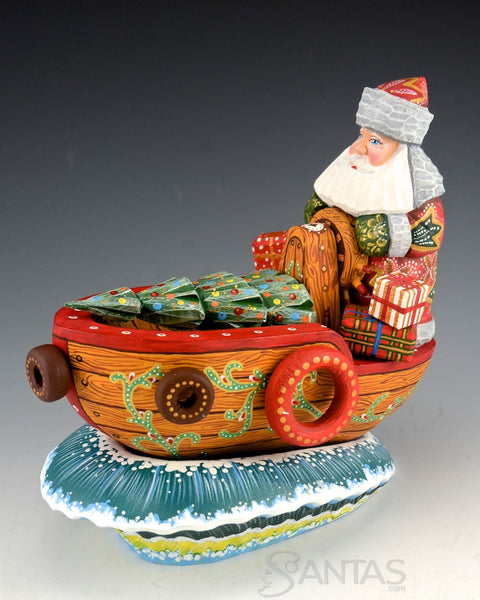 Captain Santa in Boat with Tree and Gifts
