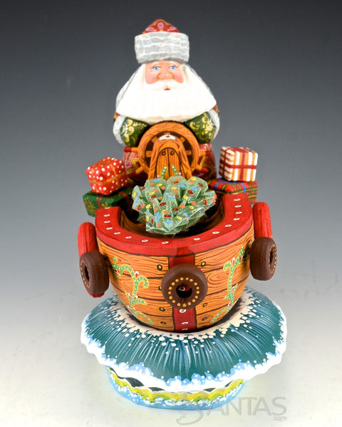 Captain Santa in Boat with Tree and Gifts