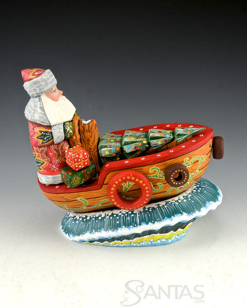 Captain Santa in Boat with Tree and Gifts